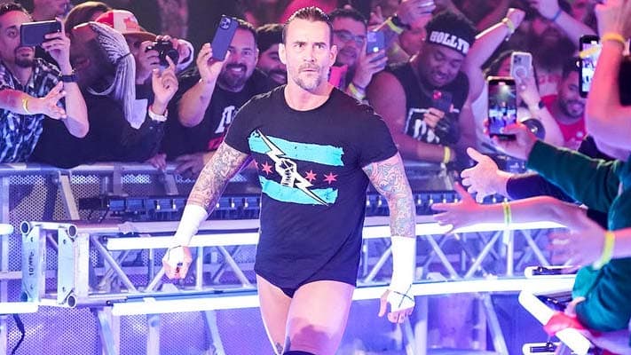 CM Punk Recreates Iconic WWE Championship Photo After RAW Victory
