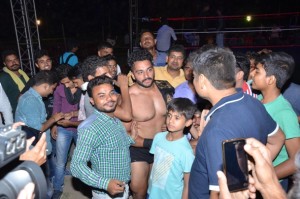 Deep Randhawa meeting wrestling fans after capturing Hardcore title belt.